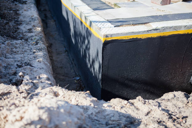 Professional Waterproofing technician working in Belleville, WI